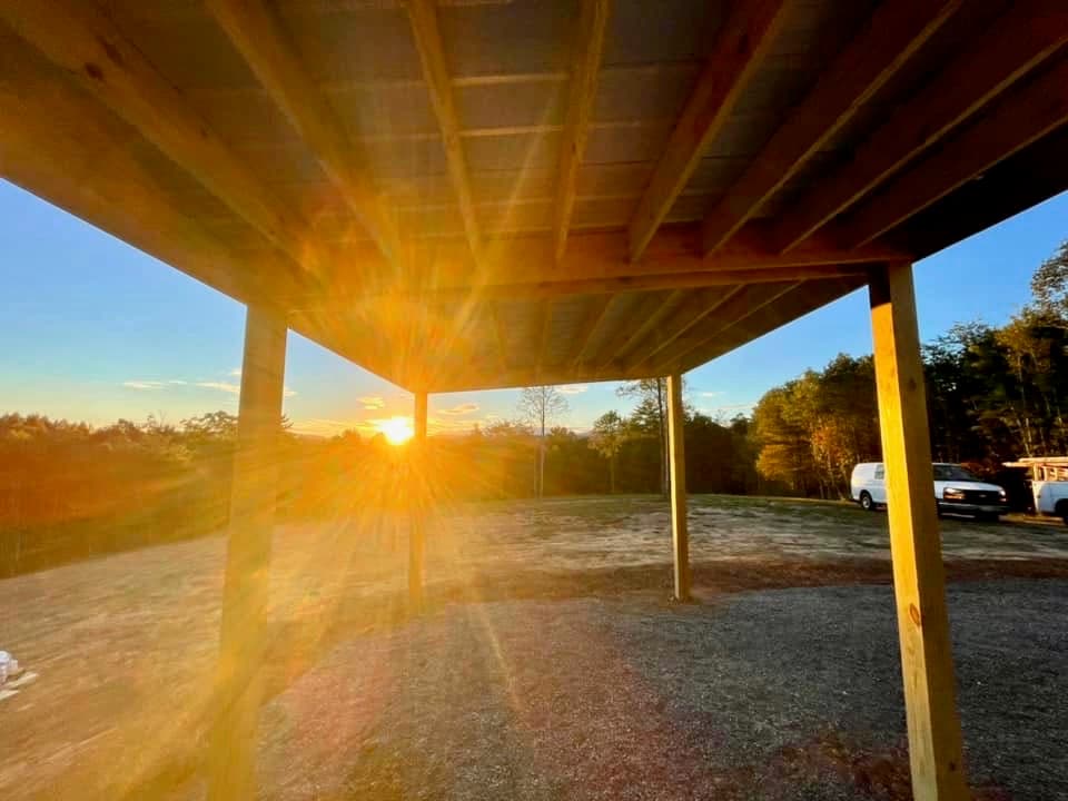 Under a newly built deck at sunset
